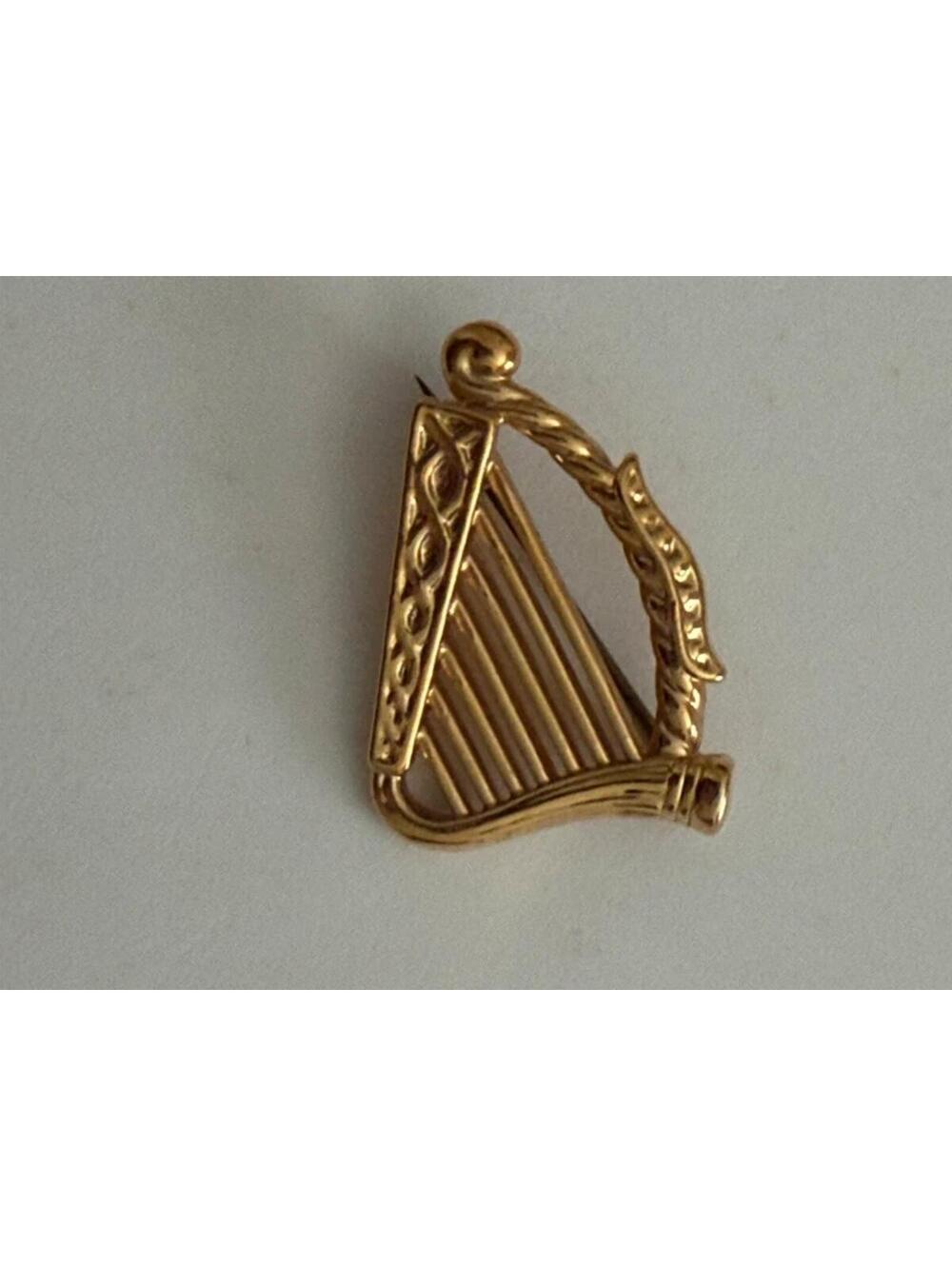Vntage Celtic harp brooch is a gold-tone Irish accessory